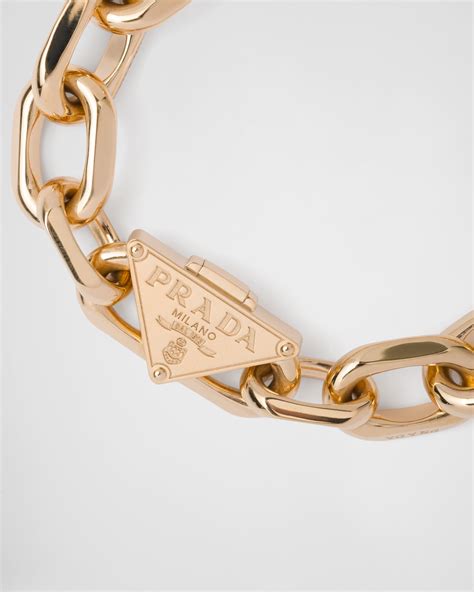 gold prada bracelet